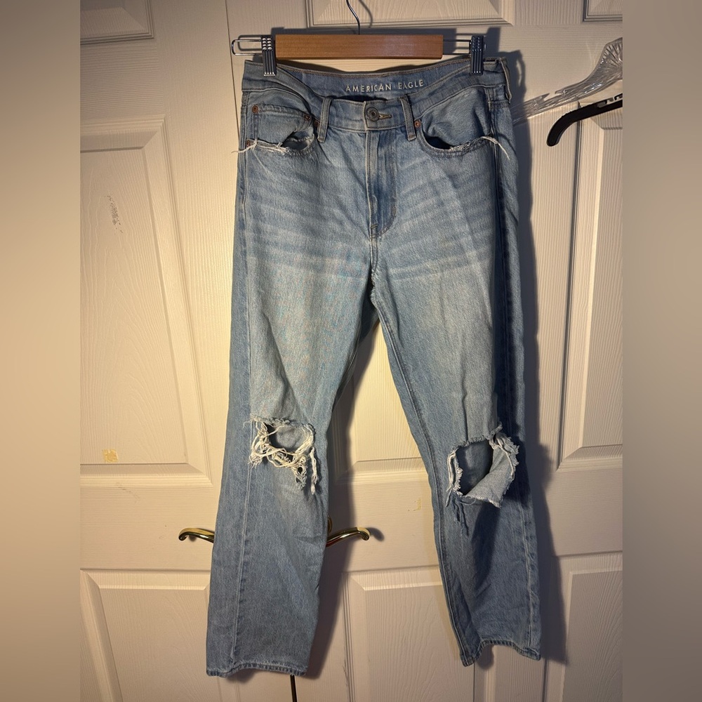 American Eagle Light Wash Denim with Tan Patch